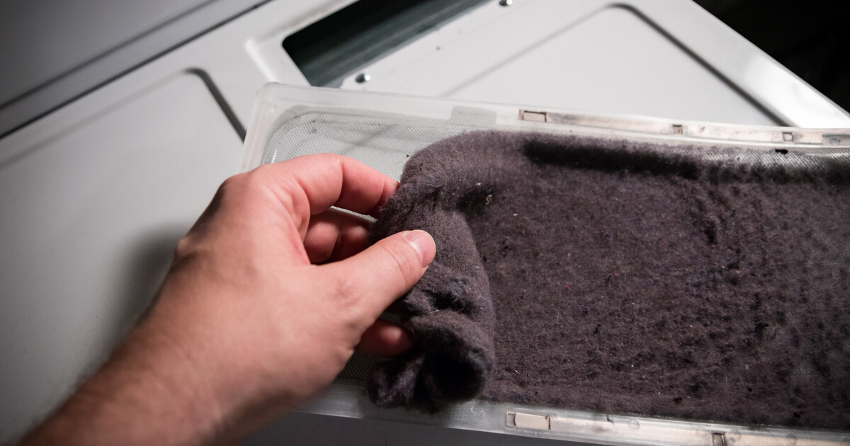 Lint build-up can lead to a burning smell from a dryer.